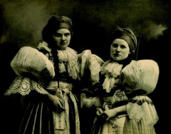 Two females in national costumes Two females in national costumes