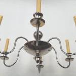 Chandelier in white metal and thin arms Chandelier in white metal and thin arms