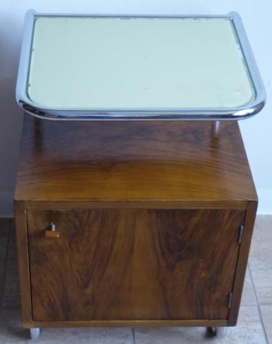 Bedside table made of bent tubes and wooden cabine Bedside table made of bent tubes and wooden cabine