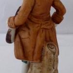 Hand-painted statue of a musician with mandolin Hand-painted statue of a musician with mandolin
