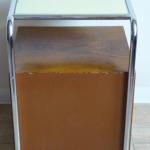 Bedside table made of bent tubes and wooden cabine Bedside table made of bent tubes and wooden cabine