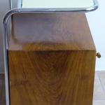 Bedside table made of bent tubes and wooden cabine Bedside table made of bent tubes and wooden cabine