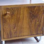 Bedside table made of bent tubes and wooden cabine Bedside table made of bent tubes and wooden cabine